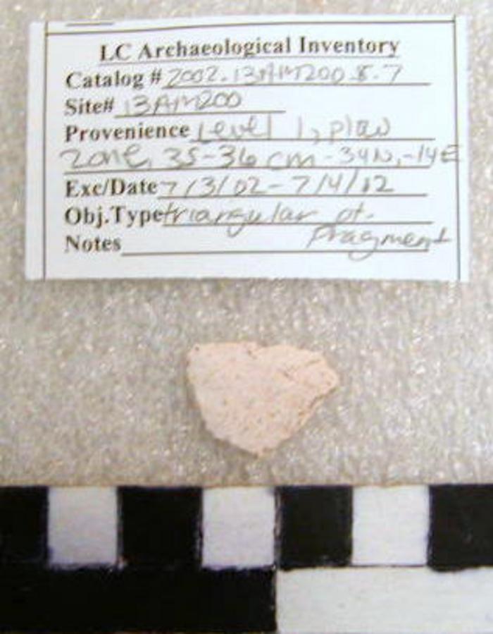 2002.001.00052; Stone Projectile Point- Triangular