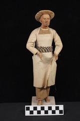 E1280: India- Clay Figurine, Indian Barber