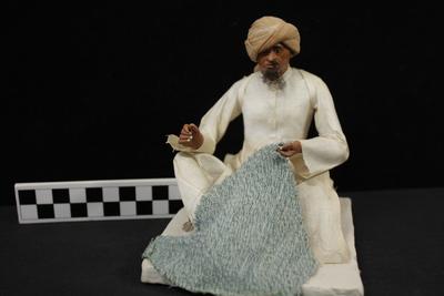 E1320: India- Clay Figurine, The Tailor or "Durzi"