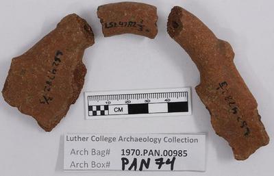 1970.PAN.00985: Decorated handle fragments