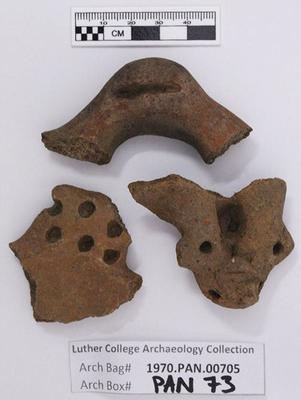 1970.PAN.00705: Decorated handle fragments