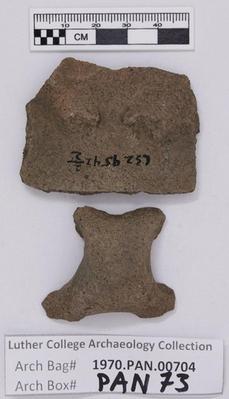 1970.PAN.00704: Plain ware body sherd with handle fragment